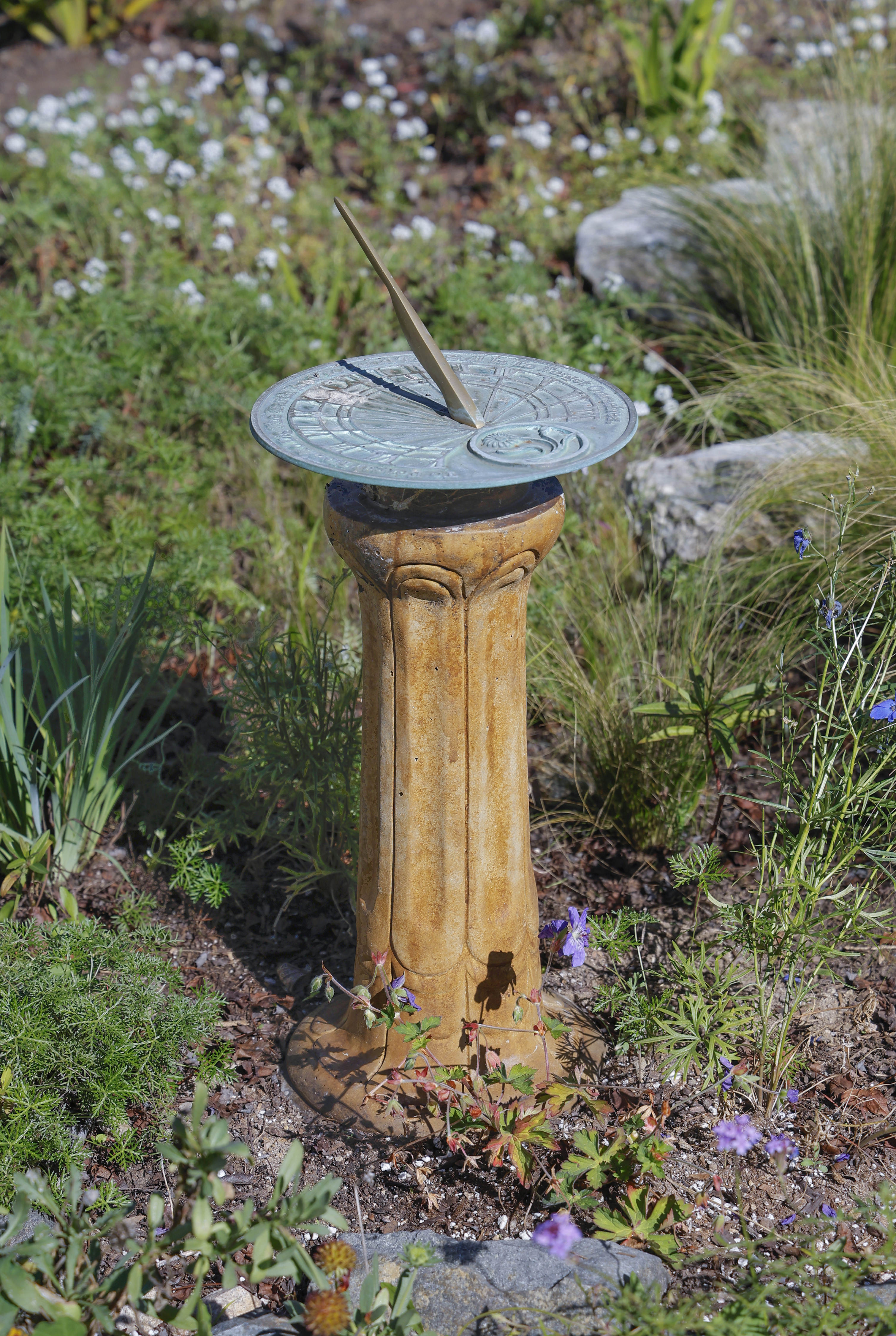 A sundial helps keep track of time in the garden....