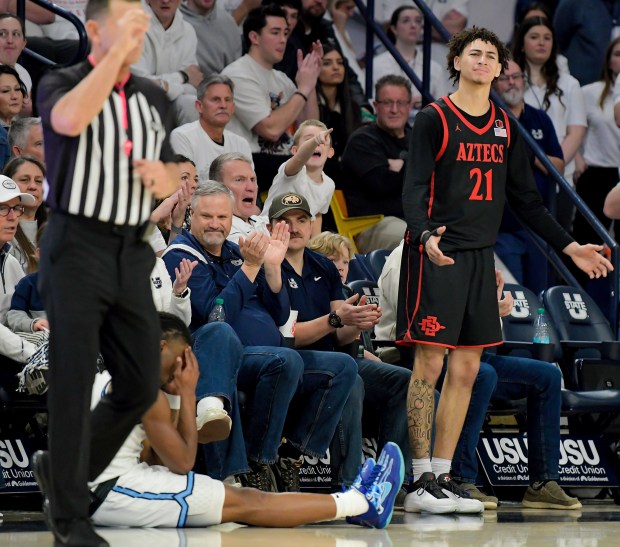San Diego State guard Miles Byrd (21) reacts after getting called for a foul against Utah State guard Kolby King on Saturday, Jan. 31, 2026, in Logan.