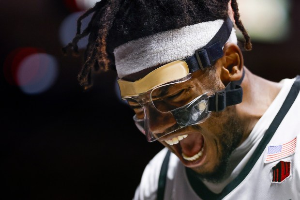 Pharaoh Compton #5 of San Diego State celebrates after a dunk against Utah State during their game at Viejas Arena on Wednesday, Feb. 25, 2026 in San Diego, California. (Meg McLaughlin / The San Diego Union-Tribune)
