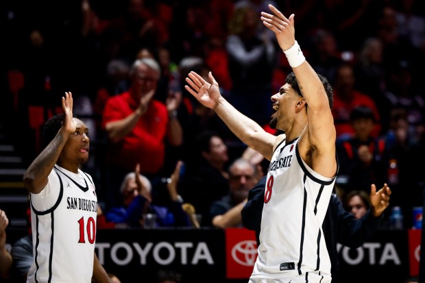 Tae Simmons #8 of San Diego State celebrates during the Aztecs' game against Utah State at Viejas Arena on Wednesday, Feb. 25, 2026 in San Diego, California. (Meg McLaughlin / The San Diego Union-Tribune)