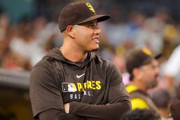 Manny Machado #13 of the San Diego Padres looks on in the dugout during the eighth inning against the Milwaukee Brewers at Petco Park on Tuesday, Sept. 23, 2025 in San Diego, California. (Meg McLaughlin / The San Diego Union-Tribune)