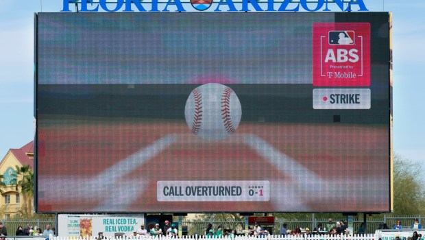 The scoreboard at Peoria Stadium shows the successful ABS challenge by Padres catcher Luis Campusano in the second inning of Friday's spring training game against the Seattle Mariners. (K.C. Alfred / The San Diego Union-Tribune)