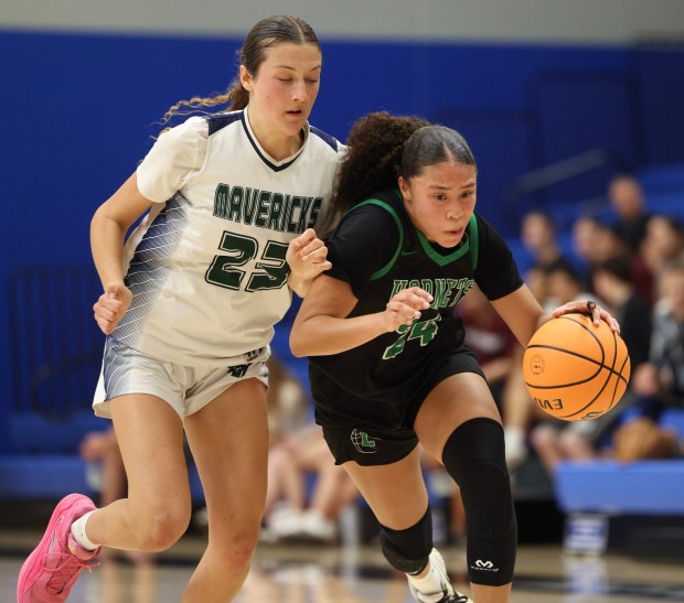 SAN MARCOS, CA - February 27, 2026: Lincoln's Malissa McKoy drives toward the basket as La Costa Canyon's Keani Brown defends in the second half of the CIF Division 2 Girls basketball championship at California State University San Marcos in San Marcos on Friday, February 27, 2026. (Hayne Palmour IV / For The San Diego Union-Tribune)