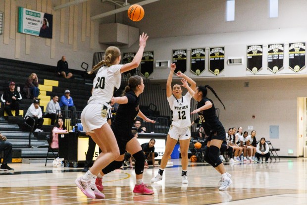 Westview's Sarah Heyn passes the ball to Mia Jacobson during a match against Mission Hills at Westview High School on Wednesday, February. 11 2026 in San Diego. Westview Wolverines defeated Mission Hills Grizzlies 49-43. (Kristian Carreon / The San Diego Union-Tribune)