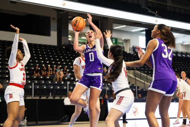 Carlsbad High's Georgia Hawk shoots against Imperial High during the CIF Division 1 championship at Frontwave Arena in Oceanside on Saturday, Feb. 28, 2026. The Lancers defeated the Tigers 54-50. (Kristian Carreon / The San Diego Union-Tribune)