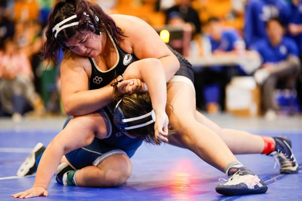 Olympian's Elisa Najera wrestles San Marcos' Nirvana Tapia during their 235-pound match at Rancho Bernardo High School on Saturday, Feb. 7, 2026 in San Diego, California. (Meg McLaughlin / The San Diego Union-Tribune)