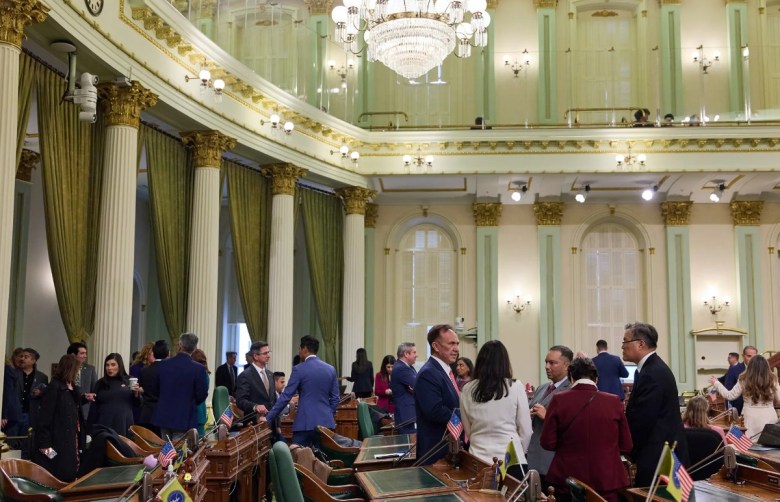 Lawmakers talk in the state Assembly