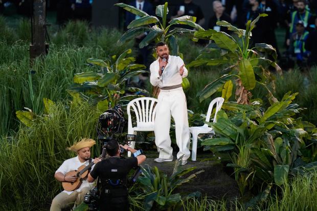 Ricky Martin performs with Bad Bunny during halftime of the NFL Super Bowl 60 football game between the Seattle Seahawks and the New England Patriots, Sunday, Feb. 8, 2026, in Santa Clara, Calif. (AP Photo/Frank Franklin II)