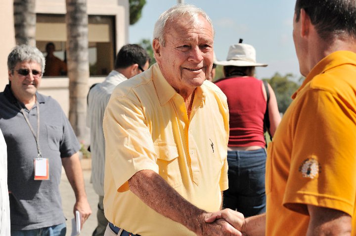 Arnold Palmer greets a fan at Rolling Hills Country Club...