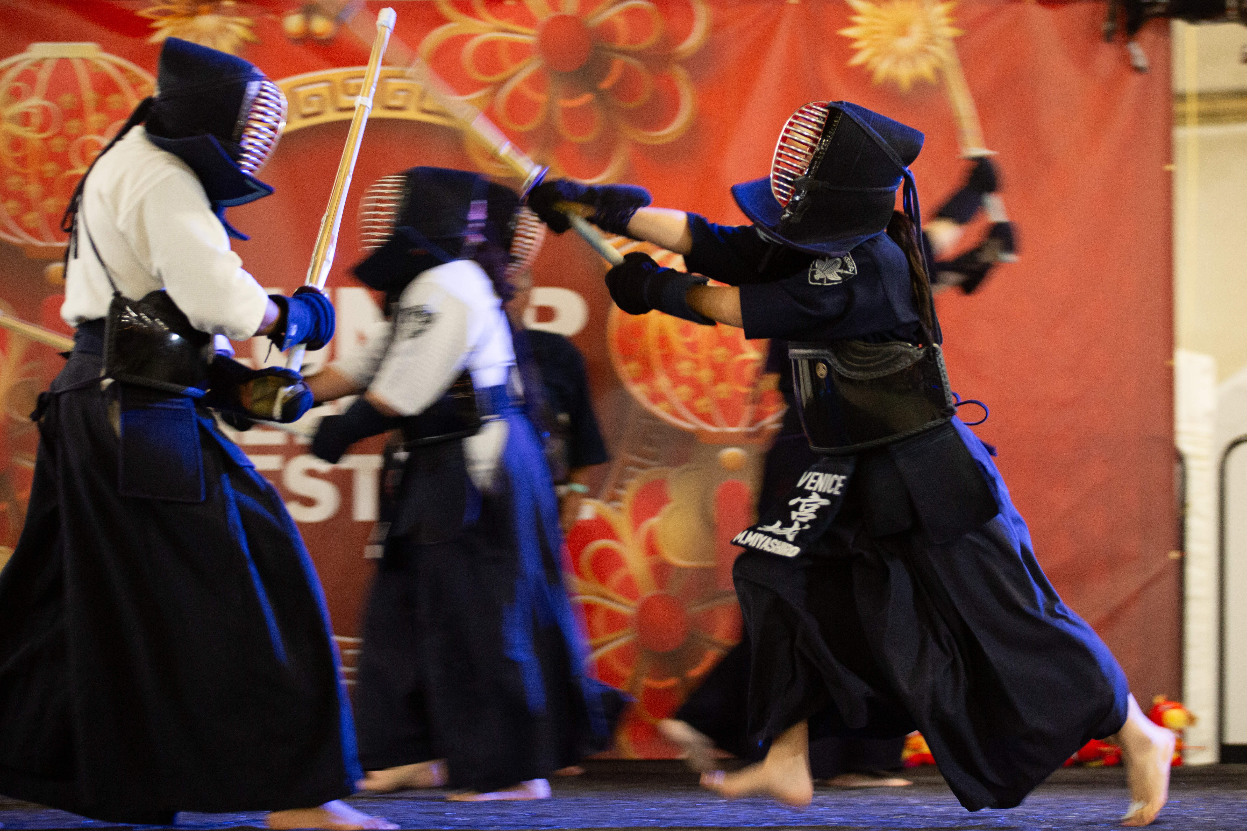 Members of the Venice Kendo Club spar together during a...