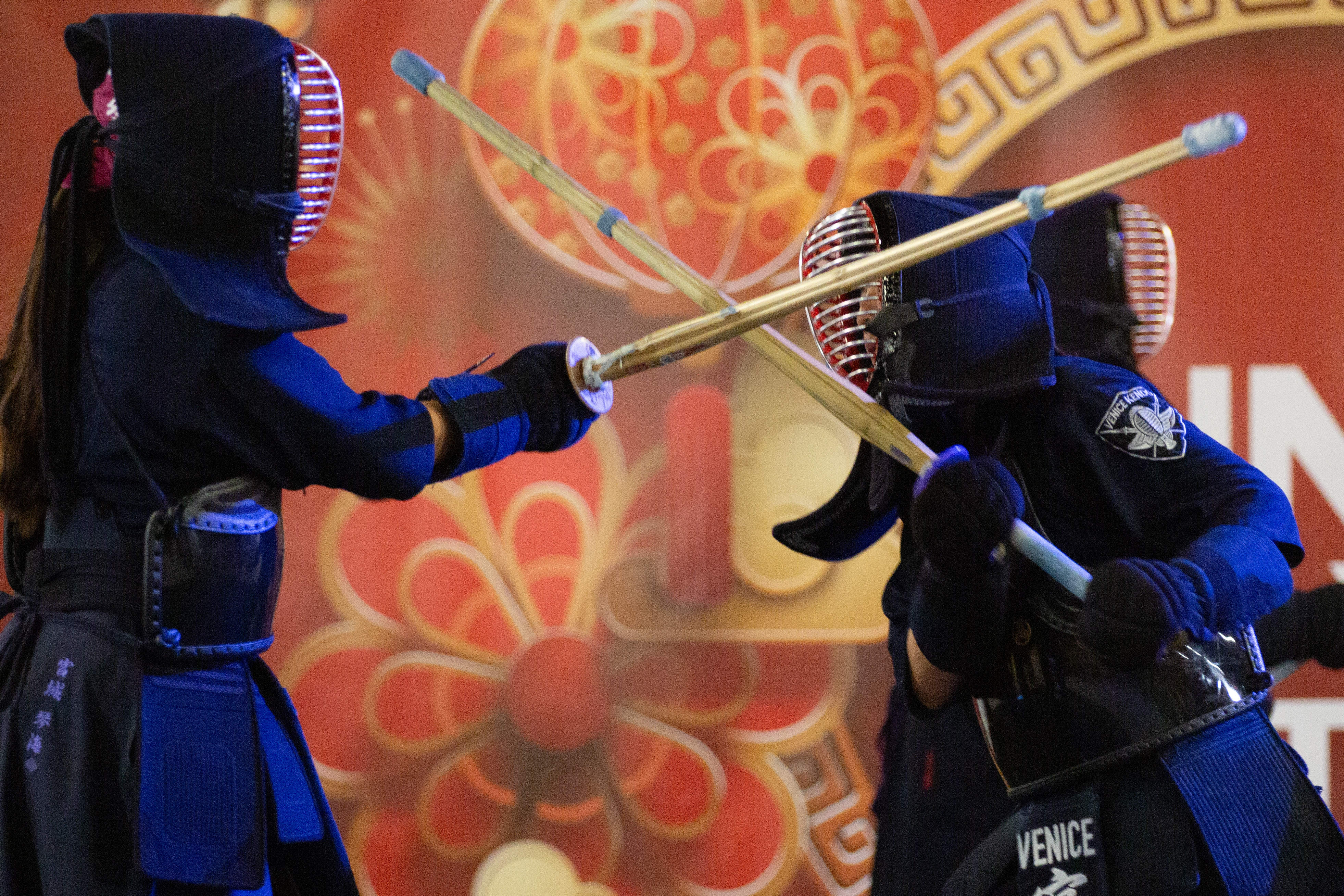 Members of the Venice Kendo Club spar together during a...