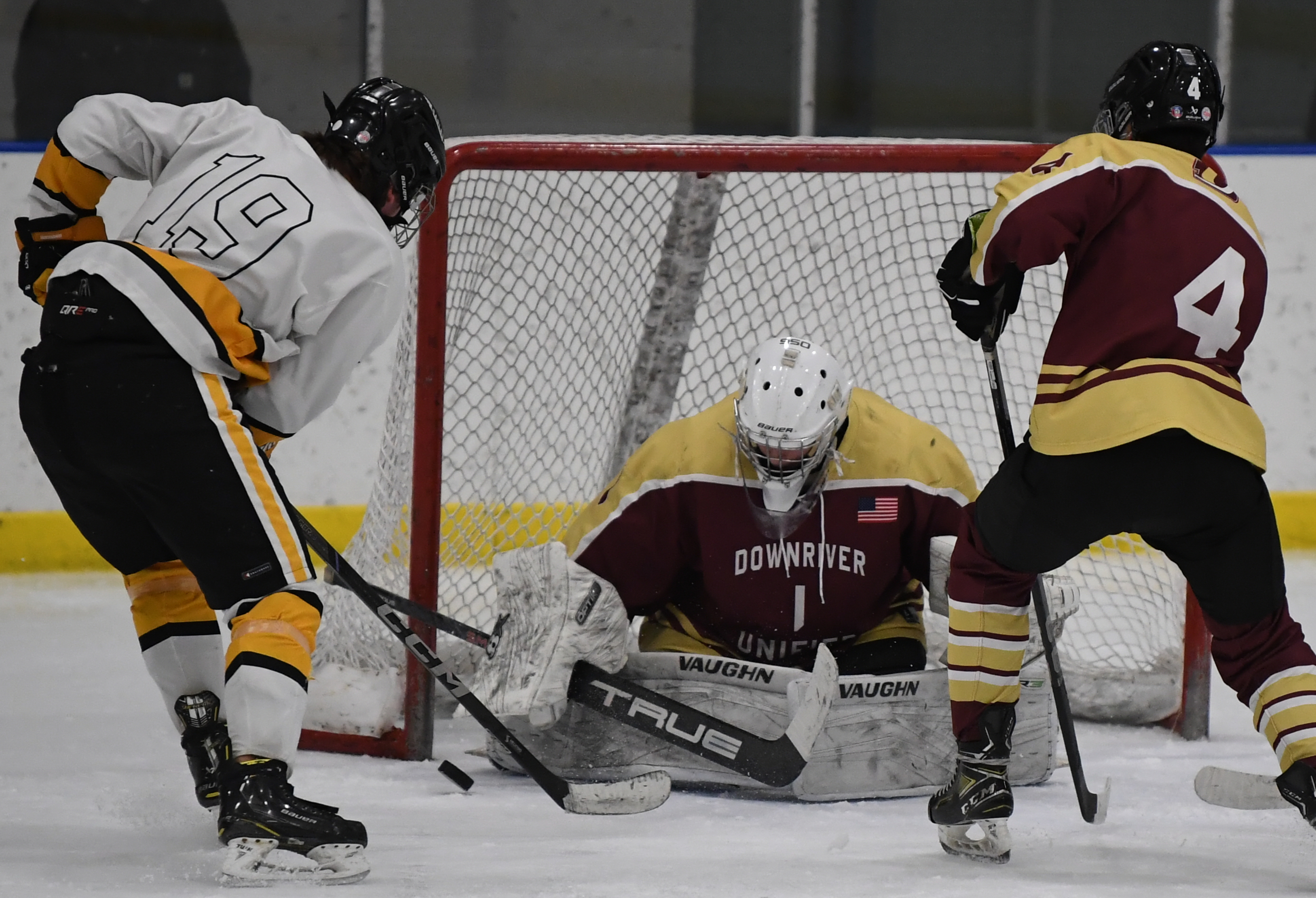 Downriver Unified Goalie Owen Calhoun makes a save against North...