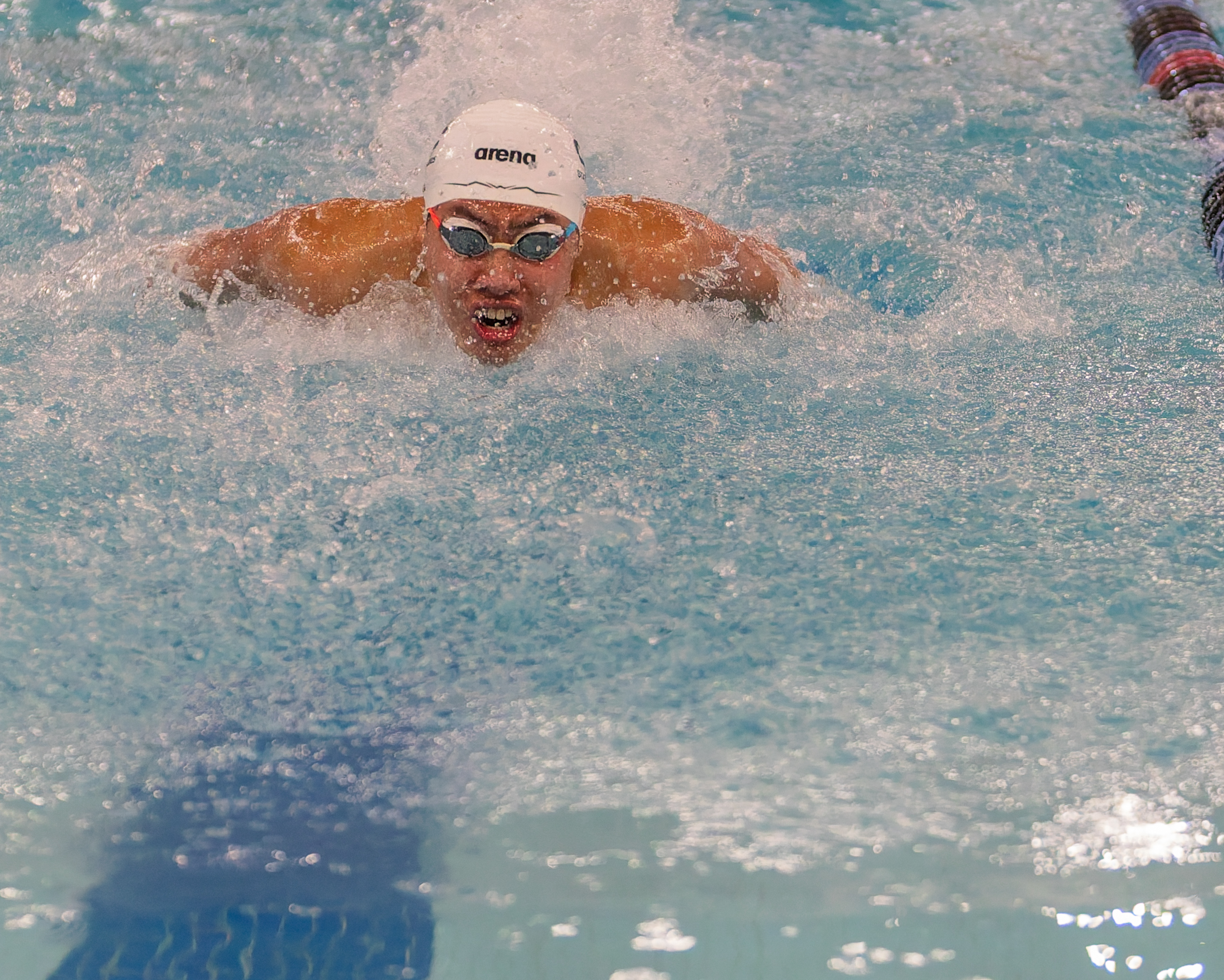 Cranbrook-Kingswood's Ethan Xu swims in the 200-yard IM at the...