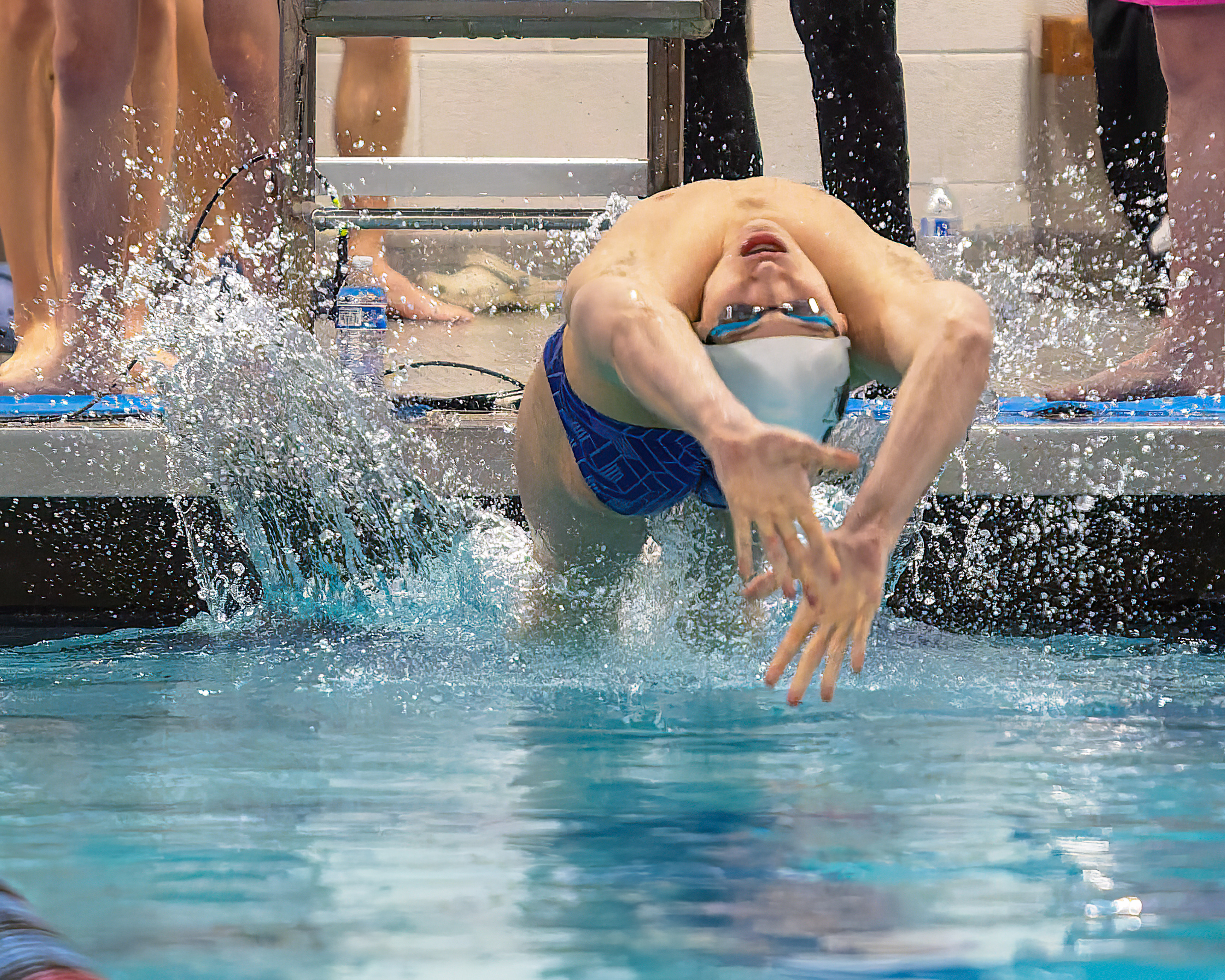 Milford/Lakeland's Sam Campbell swims in the 100-yard backstroke at the...