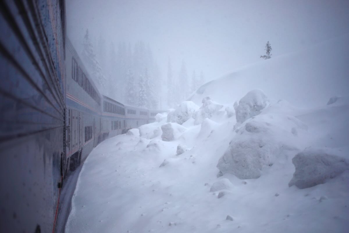 View from onboard passenger train in snow