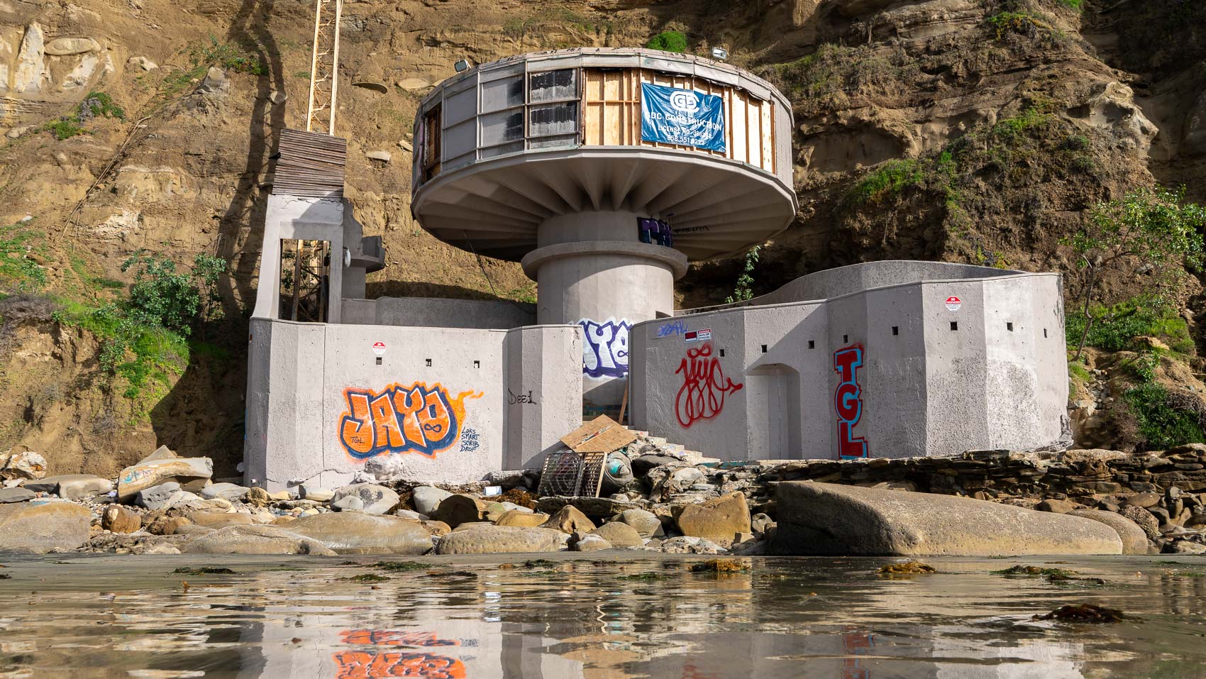 La Jolla's iconic Mushroom House is now a public nuisance and graffiti canvas. Its future is anyone's guess