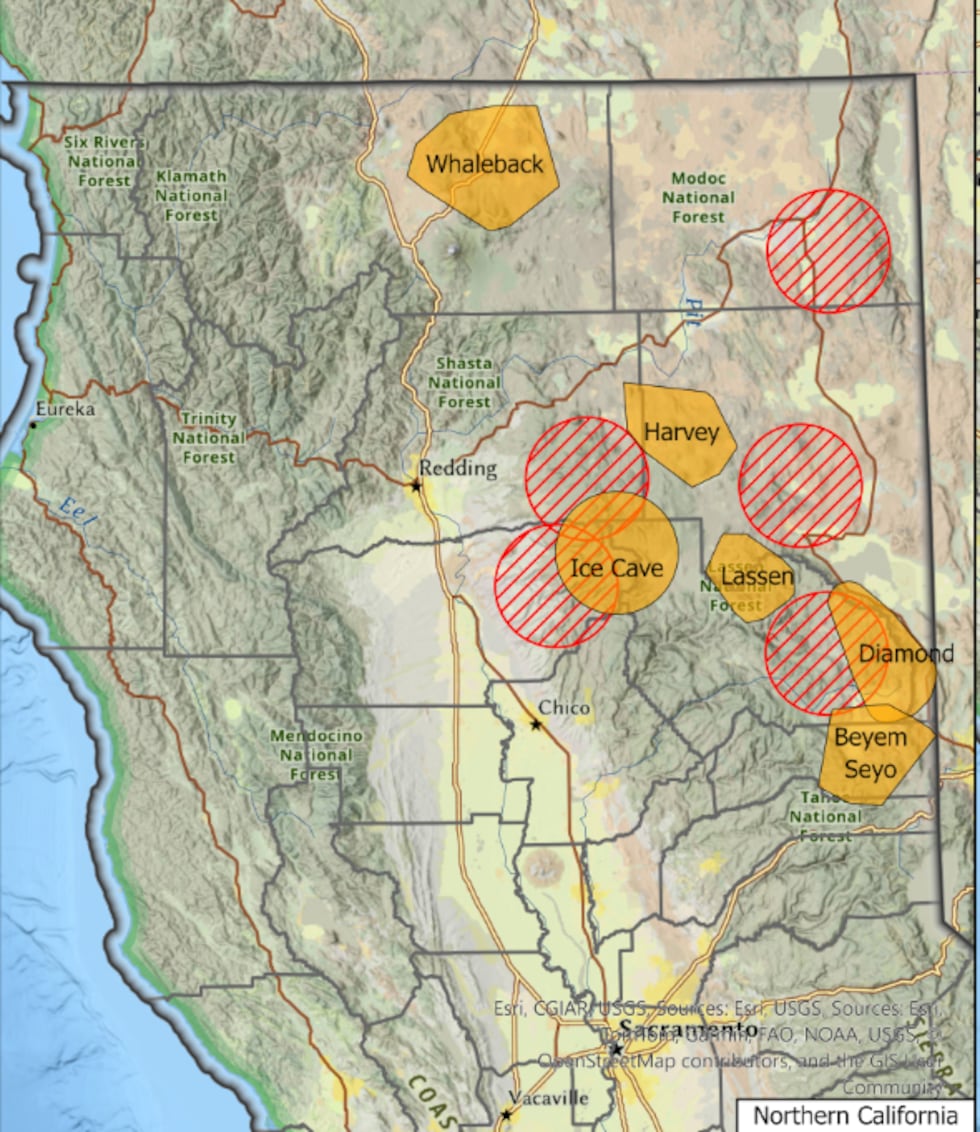 Orange marks pack territory and red lines designate area of gray wolf activity in northern...