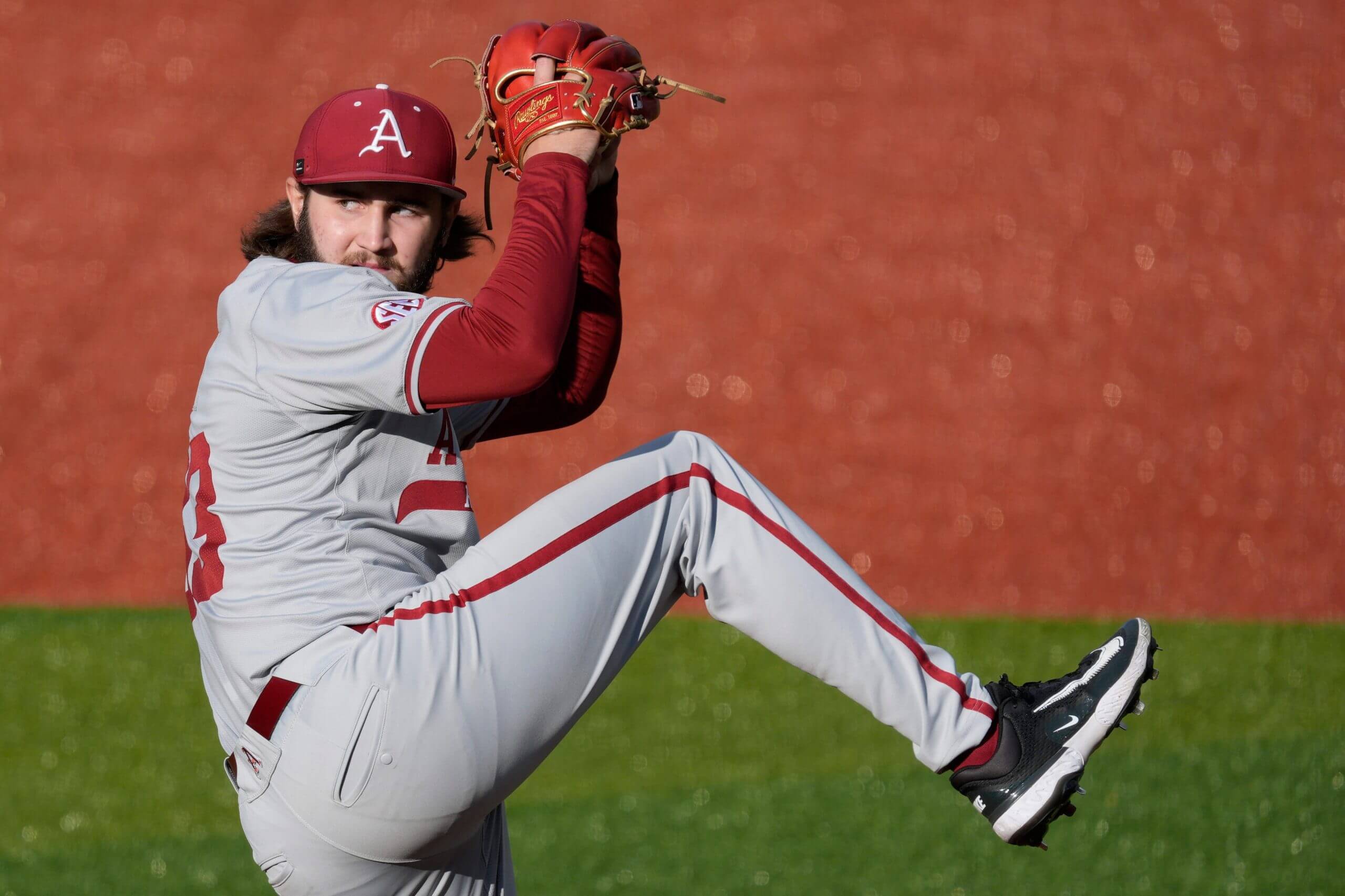 Arkansas pitcher Zach Root (33) looks to throw a pitch during a NCAA baseball game against Georgia in Athens, Ga., on Friday, April 11, 2025. 