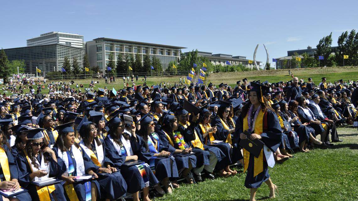 A UC Merced graduation ceremony. A federal proposal to eliminate Graduate PLUS loans would restrict access to training for teachers and social workers, worsening California workforce shortages.