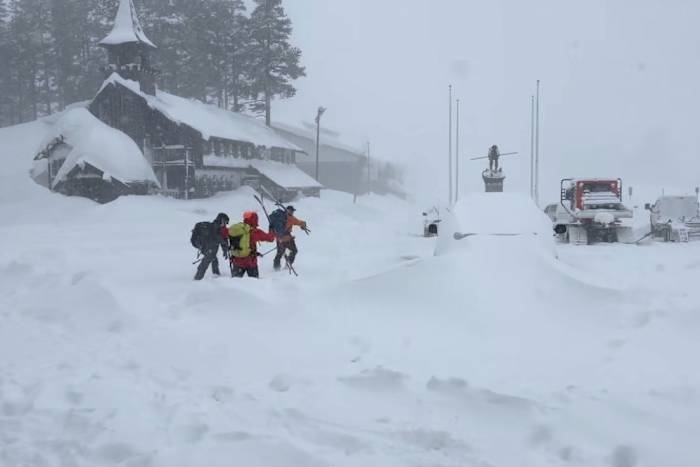 Rescuers push through winter storm to 6 survivors of a California avalanche. 9 others are missing