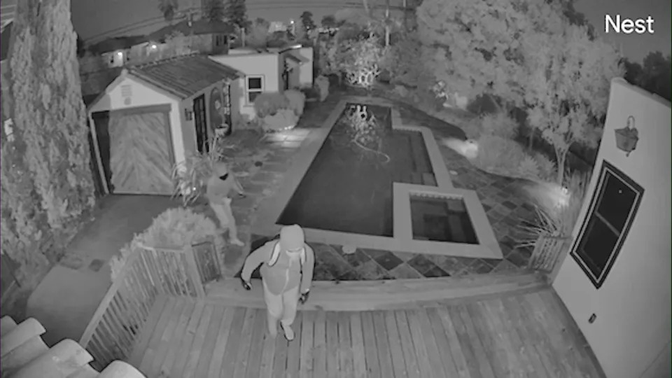 Surveillance video showed three hooded suspects targeting a home in L.A.'s Mid-Wilshire neighborhood in January 2026.