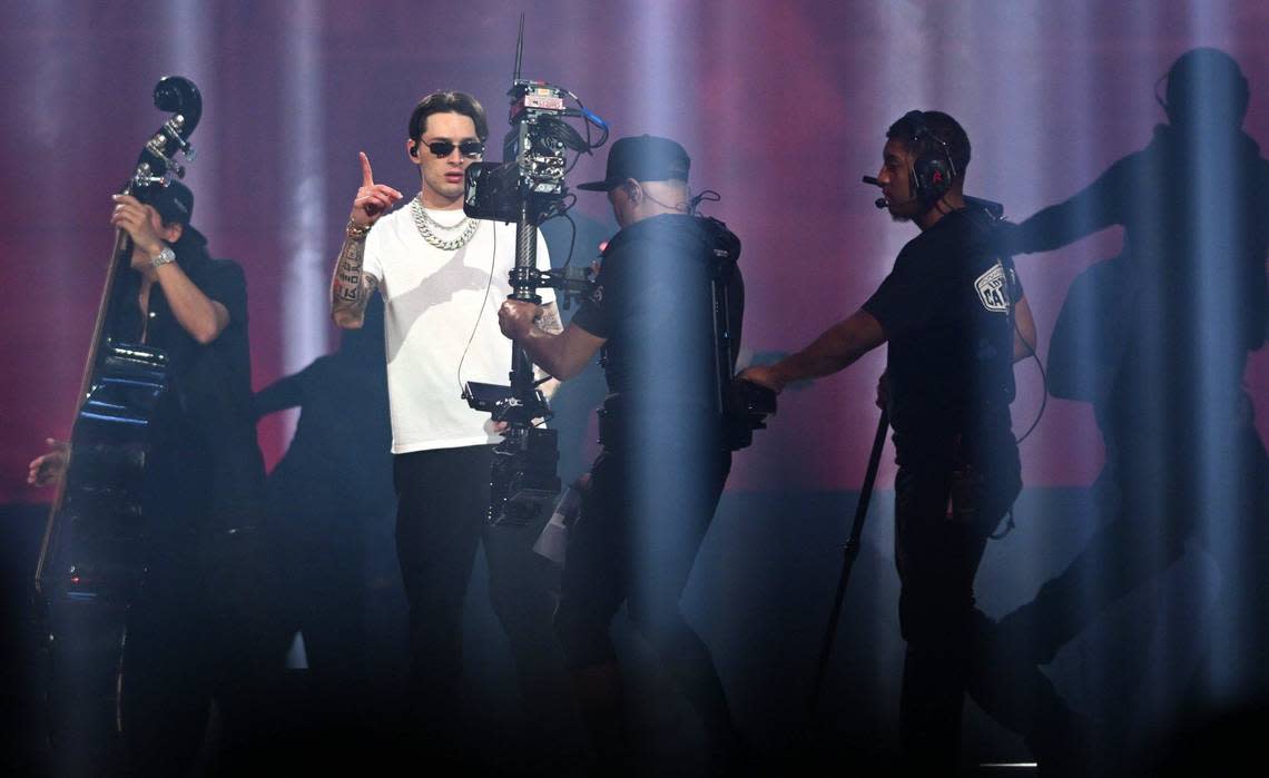 Peso Pluma plays to the camera on his Exodo Tour at the Save Mart Center Saturday night, Sept. 7, 2024 in Fresno.