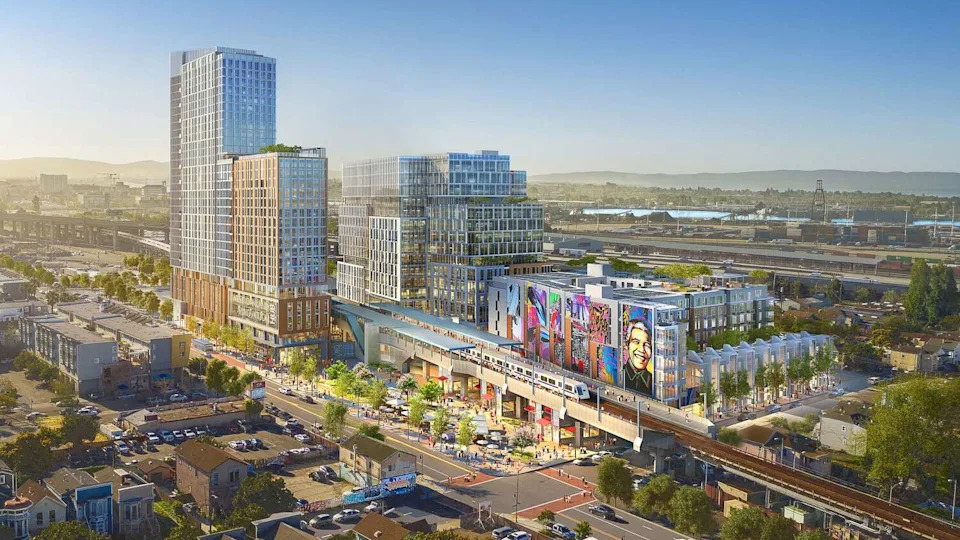 A rendering of the original mixed-used complex planned for the parking lot of the West Oakland BART station. The design has changed slightly, but the first phase, which includes affordable housing in the smaller building to the right. (JRDV Urban International)