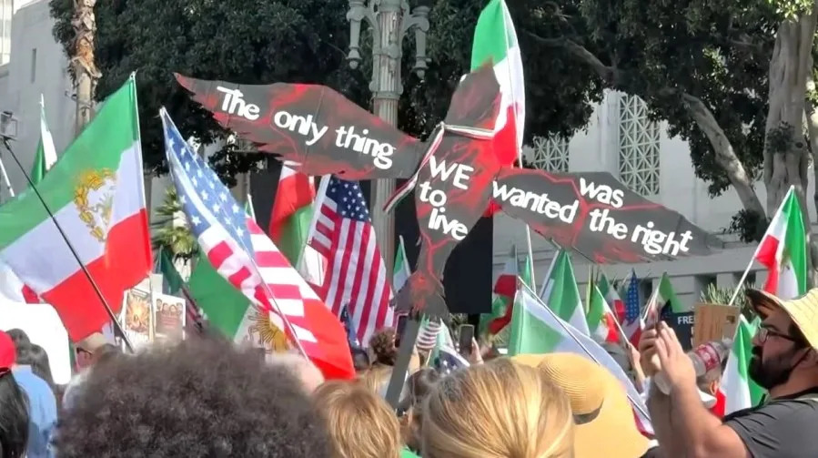 A large crowd of demonstrators gathered in downtown Los Angeles Saturday to voice their opposition to the regime in Iran and to support the Iranian people's fight for freedom on Feb. 14, 2026. (KTLA)