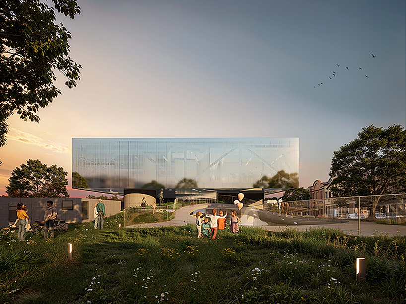 reflective metal facade wraps another side funeral home’s elevated volume in san francisco