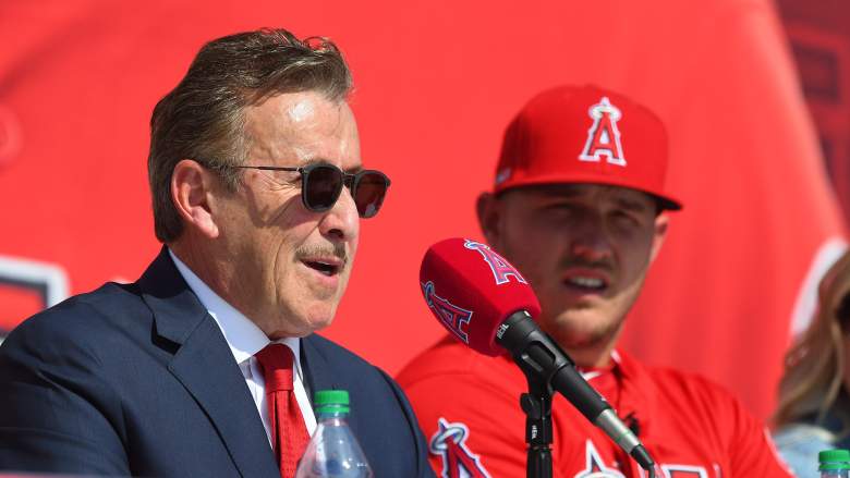 Los Angeles Angels owner Arte Moreno speaks with superstar outfielder Mike Trout looking on.