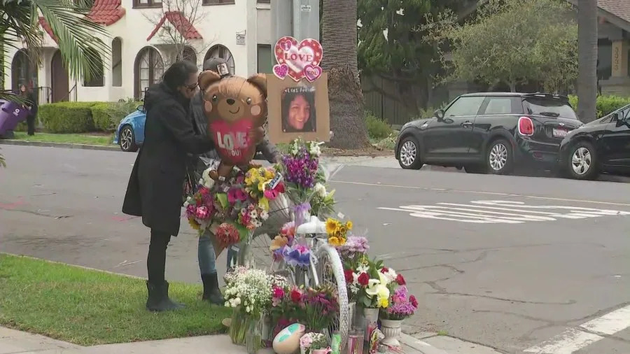 A memorial set up at the site of a hit-and-run that left a woman dead in Long Beach. Feb. 2026. (KTLA)