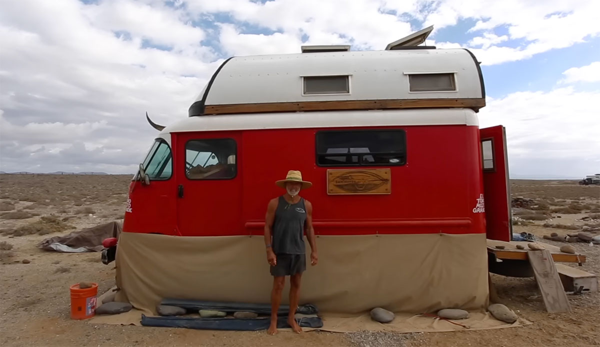 Glen Horn standing in front of his van in Baja