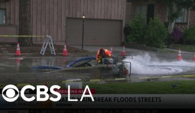 Burbank water main break traps a vehicle and damages street