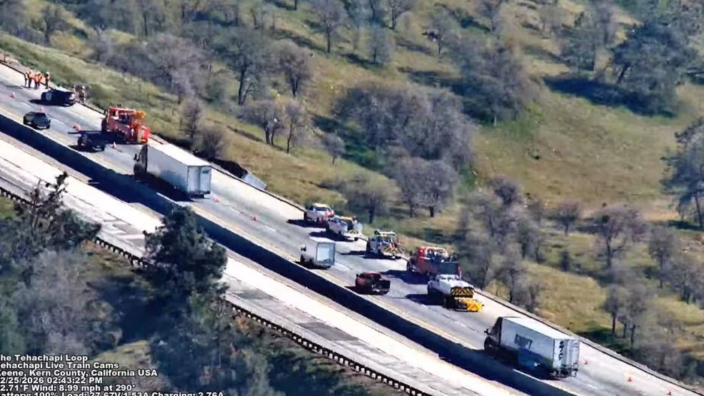 A semi-trailer truck that rolled over on Highway 58 near Tehachapi and went down an embankment on Wednesday afternoon has delayed traffic, according to CHP's website. CREDIT: Tehachapi Live Train Cams