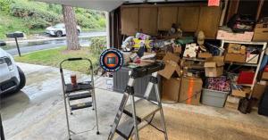 A restored custom wood garage door on a historic home in Bixby Knolls, Long Beach, after service by On The Spot.