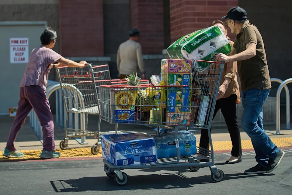 People shop at Costco in Glendale, Calif.