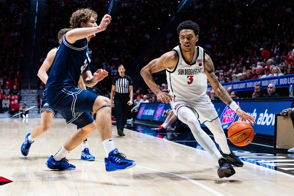 San Diego State guard Elzie Harrington (3) drives during an NCAA Basketball game between Utah State and San Diego State, Wednesday February 25, 2026 at Viejas Arena in San Diego, Calif.