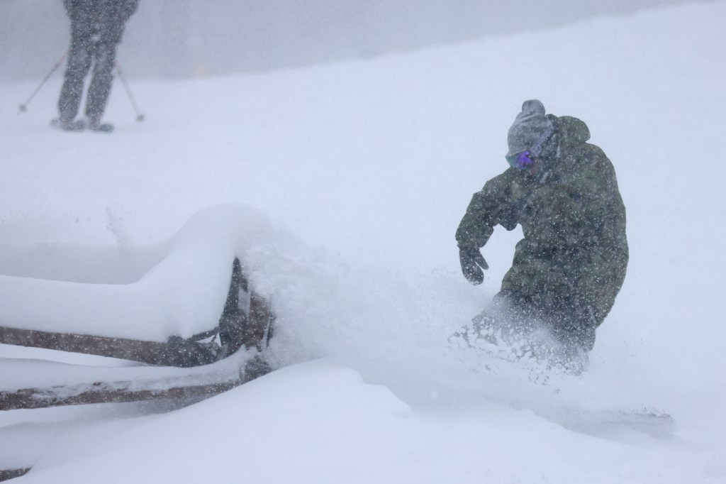 John Goggin snowboarding at Northstar California Resort.