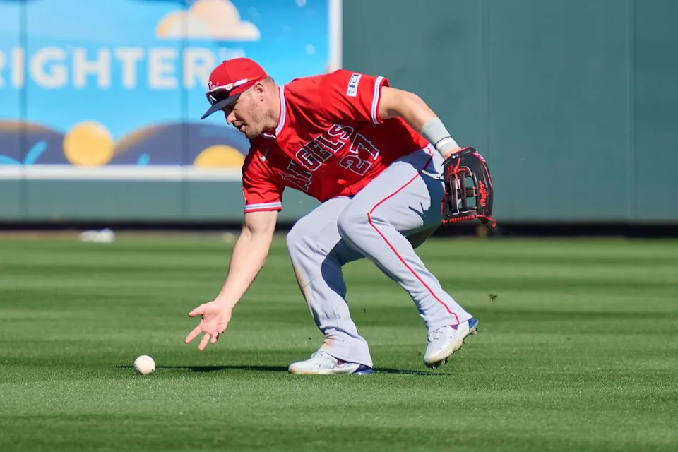The Los Angeles Angels center fielder Mike Trout (27) grabs a ground ball against The Arizona Diamondbacks ,February 22nd, 2026 in Scottsdale Arizona.