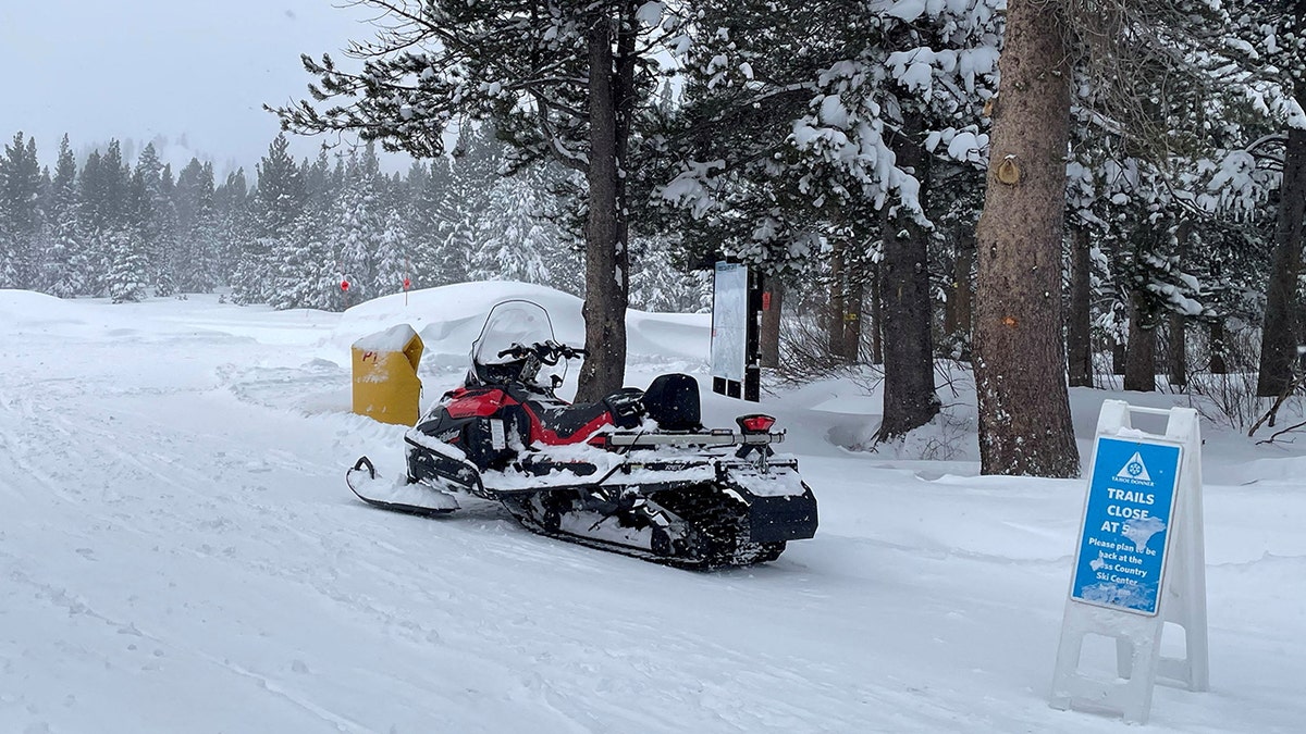 A snowmobile at the Alder Creek Adventure Center after an Avalanche in Truckee, California.