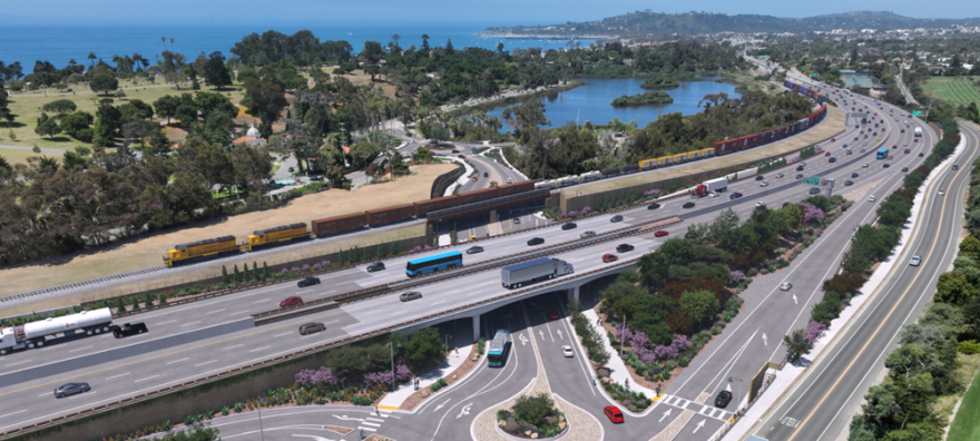 A man wears a derby hat and glasses
