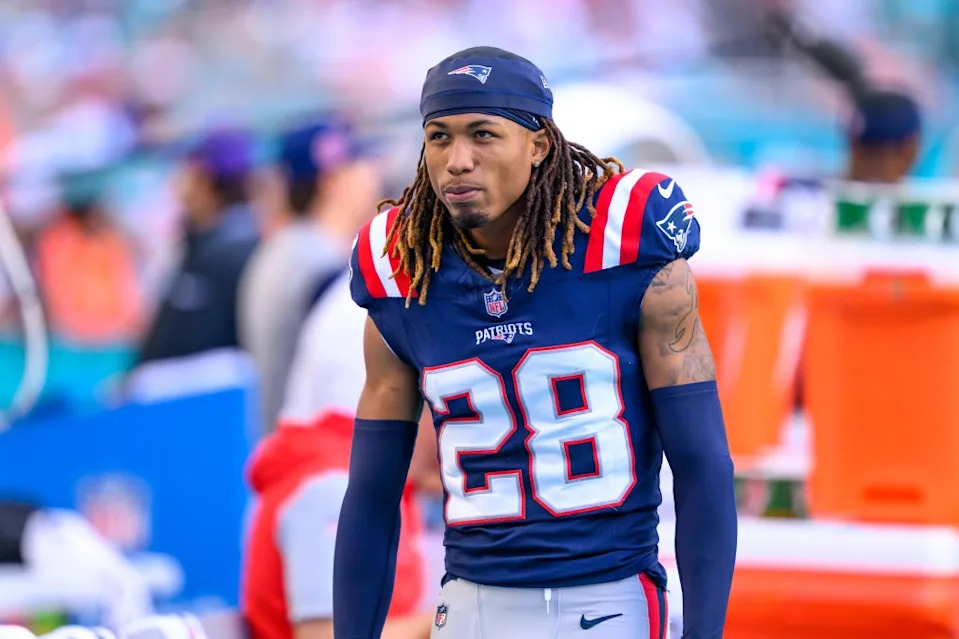 New England Patriots cornerback Alex Austin stands on the sidelines during a game against the Miami Dolphins. AP