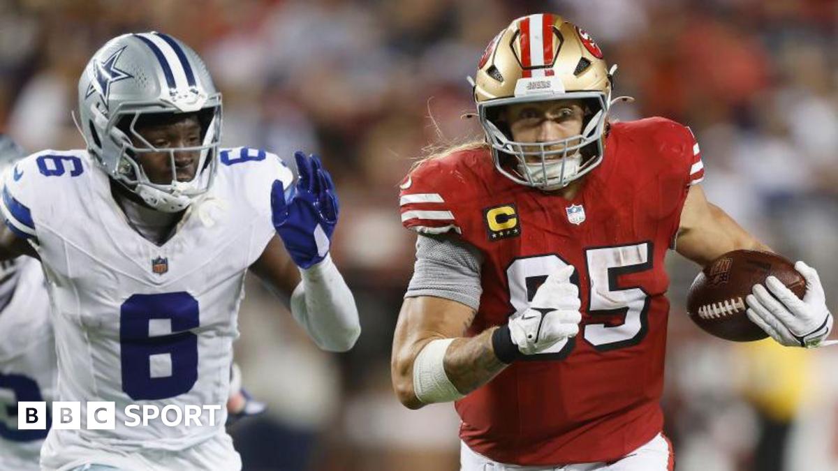 George Kittle of the San Francisco 49ers runs with the ball after a catch against the Dallas Cowboys in October 2024