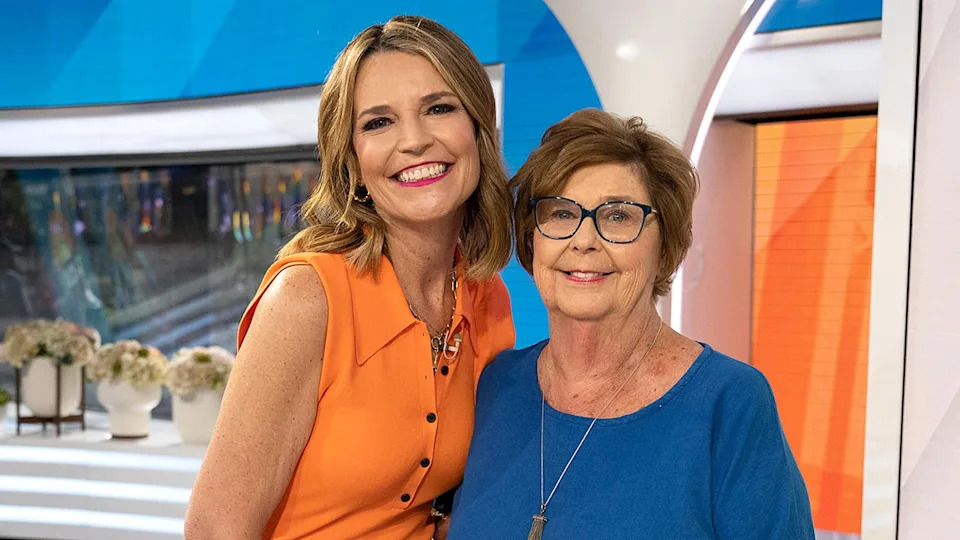 Savannah Guthrie stands beside her mother Nancy Guthrie and poses together for a photo.