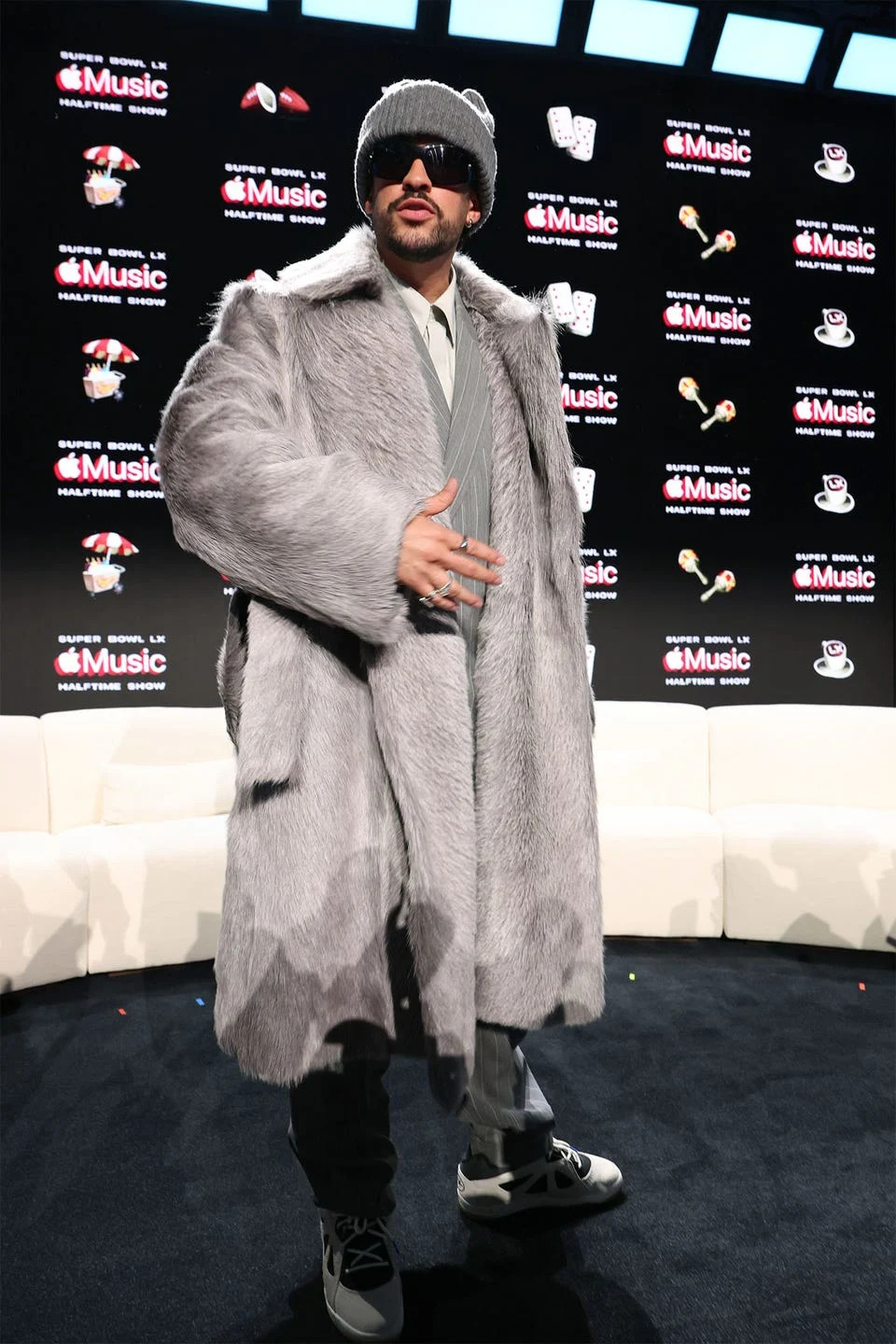 san francisco, california february 05: bad bunny appears onstage during the super bowl lx pregame apple music super bowl lix halftime show press conference at moscone center west on february 05, 2026 in san francisco, california. (photo by kevin mazur/getty images for roc nation)