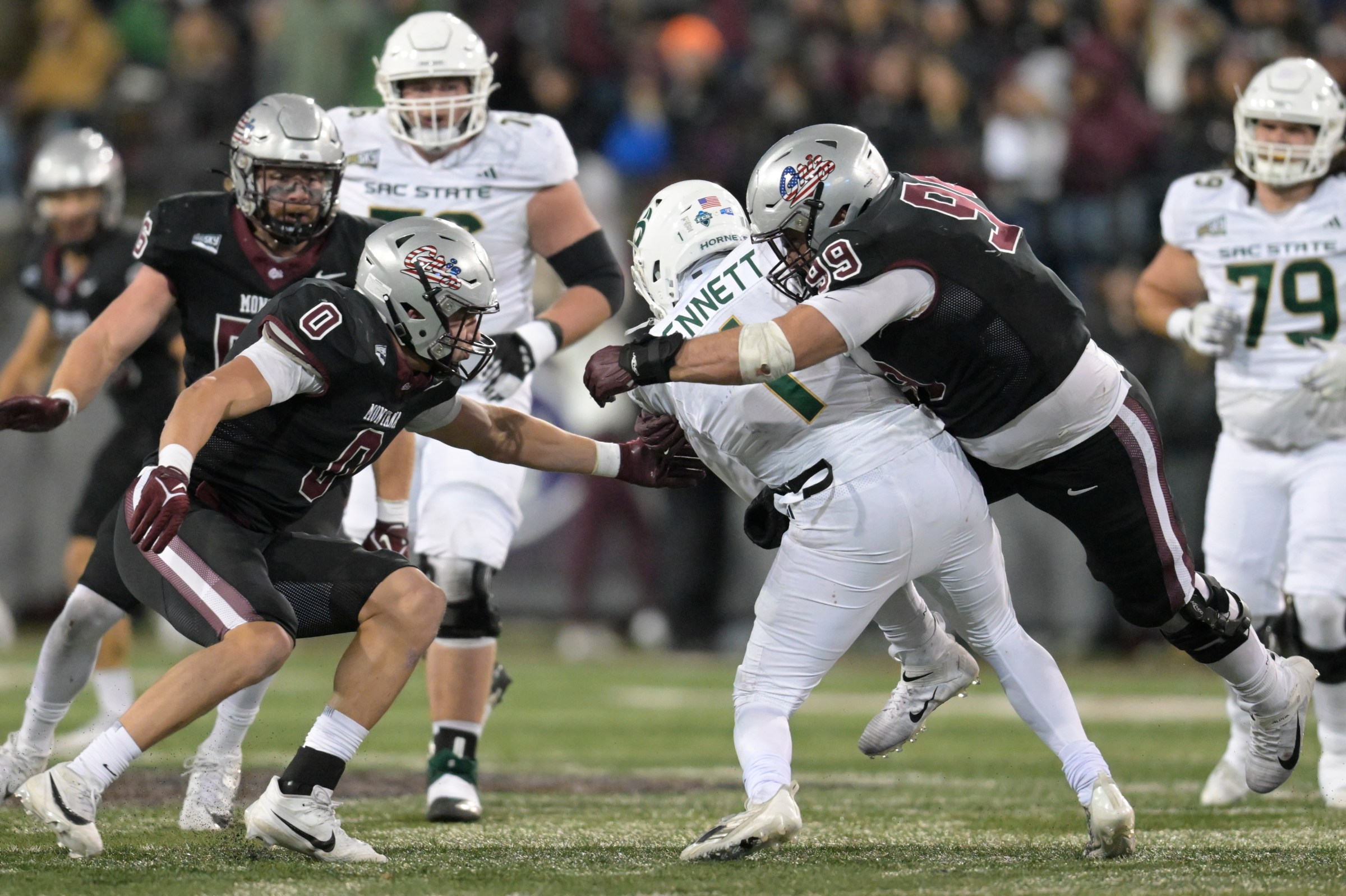 MISSOULA, MONTANA - NOVEMBER 04: Alex Gubner #99 of the Montana Grizzlies sacks Kaiden Bennett #1 of the Sacramento State Hornets during the fourth quarter at Washington-Grizzly Stadium on November 04, 2023 in Missoula, Montana. (Photo by Tommy Martino/University of Montana/Getty Images)