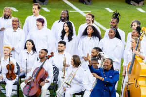 Max Gerlock and members of the Oakland Interfaith Gospel Choir