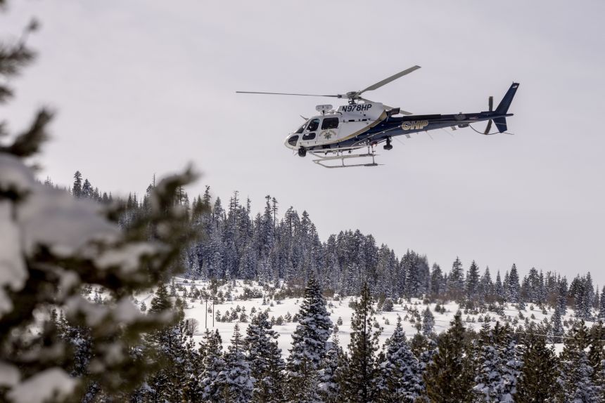 A California Highway Patrol helicopter lifts off from a field after a mission with a search and rescue crew in Truckee, California, on February 20, 2026.