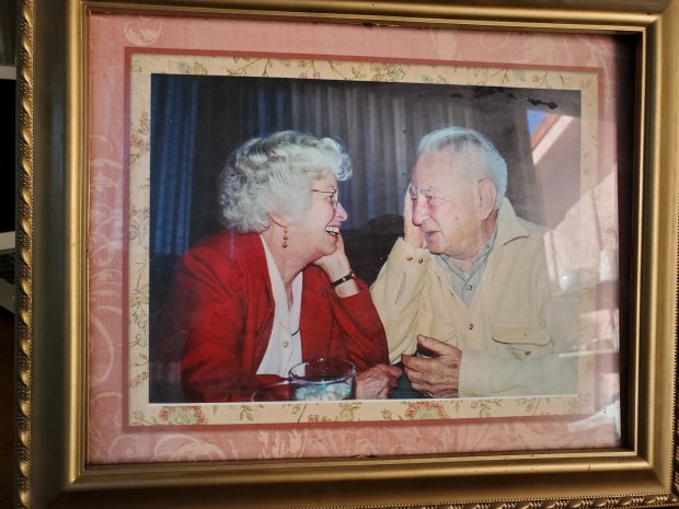 A photo in Phyllis Galambos' La Jolla home shows her and her now-late husband, Robert. (Ashley Mackin-Solomon)