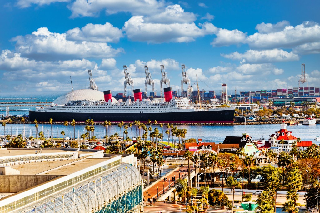 The Queen Mary ship in Long Beach with the Convention Center and other waterfront attractions.